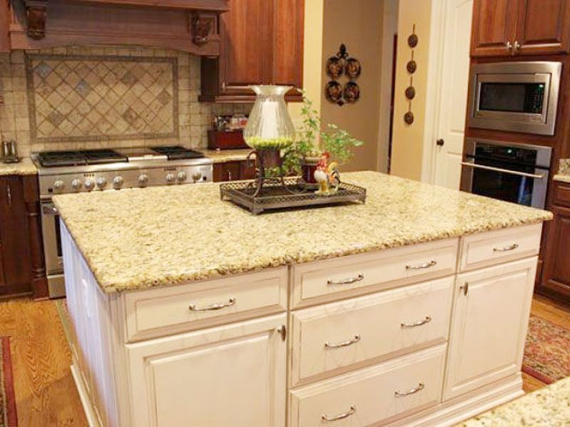 Classic style kitchen renovation with a textured granite design.