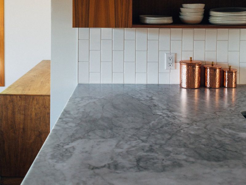 Closeup of a soapstone countertop in light grey color.
