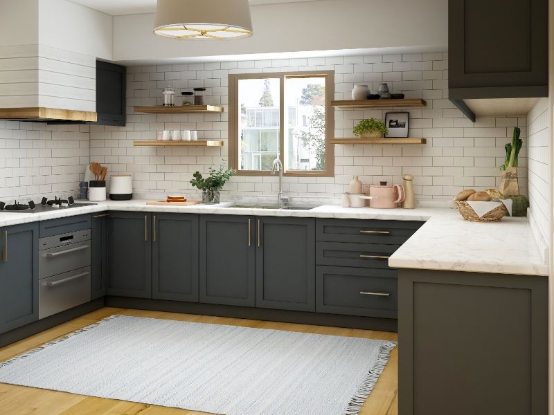 A modern design kitchen with quartzite countertop and rounded corners.