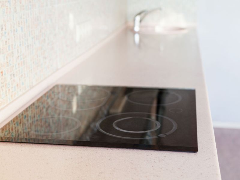 New installation of an engineered stone cooktop.